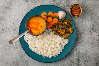 Indian cuisine dal rice veggies