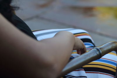 Close-up of woman riding bicycle