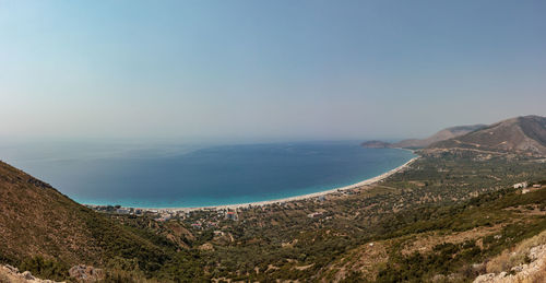 Scenic view of sea against clear blue sky