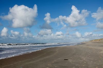 Scenic view of beach against sky