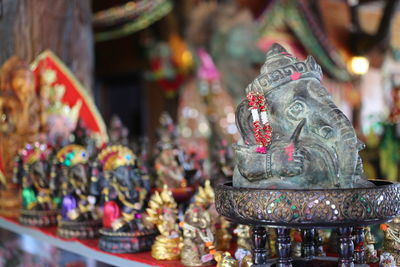 Close-up of figurine for sale in market