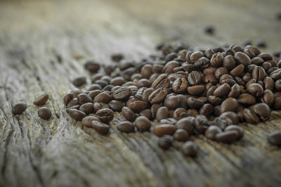 Close-up of coffee beans on table