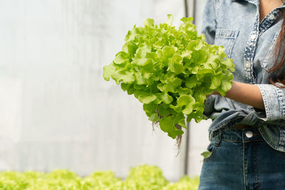 Woman holding plant