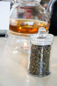 Close-up of drink in glass jar on table