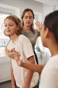 Teacher giving first aid training in case of choking