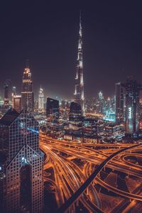 Illuminated buildings in city at night