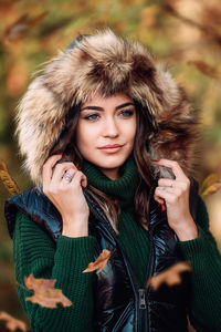 Beautiful young woman wearing winter coat