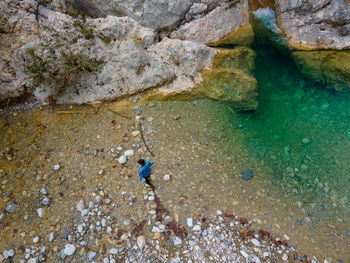 High angle view of rock formation on beach