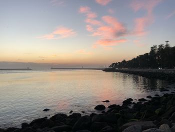 Scenic view of sea against sky during sunset