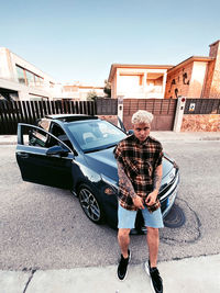 Full length of woman standing on street