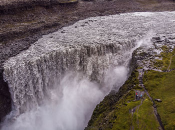 High angle view of waterfall in sea