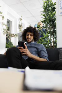 Young woman using mobile phone