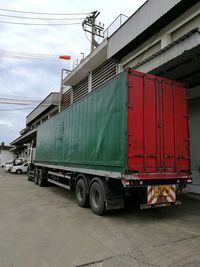 View of truck in city against sky