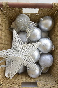 High angle view of eggs in basket on table