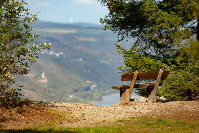 Built structure on table against trees on mountain