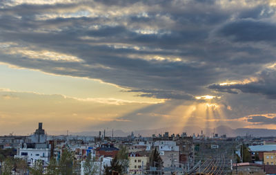 High angle view of townscape against sky at sunset