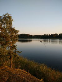 Scenic view of lake during sunset