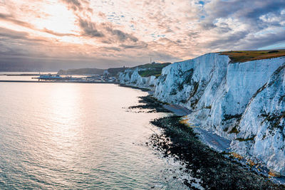 Aerial view of the white cliffs of dover. close up view of the cliffs from the sea side.