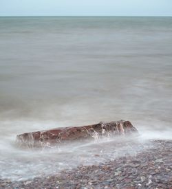 Waves splashing on rocks