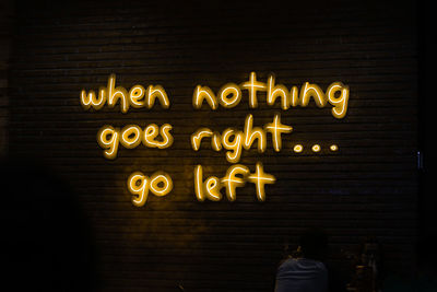 Illuminated message on wall