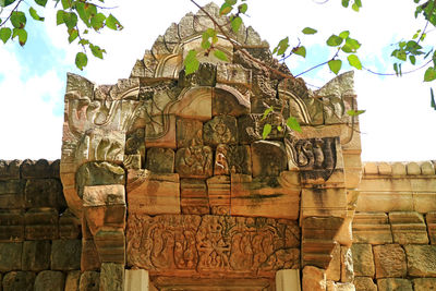 Low angle view of ornate building against sky