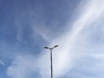 Low angle view of street light against sky