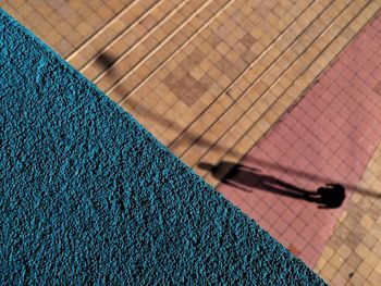 High angle view of shadow on floor