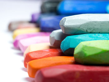 Close-up of multi colored candies on table