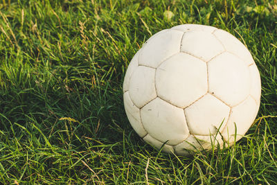 Close-up of soccer ball on field