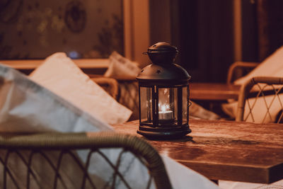 Close-up of wine glasses on table at home