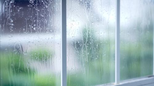 Close-up of water drops on glass window