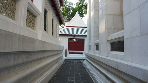 Staircase amidst buildings in city