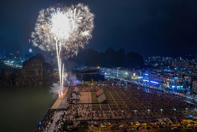 Firework display at night