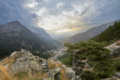 Storm clouds over a valley in italy