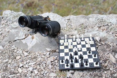 High angle view of chess camera on rock