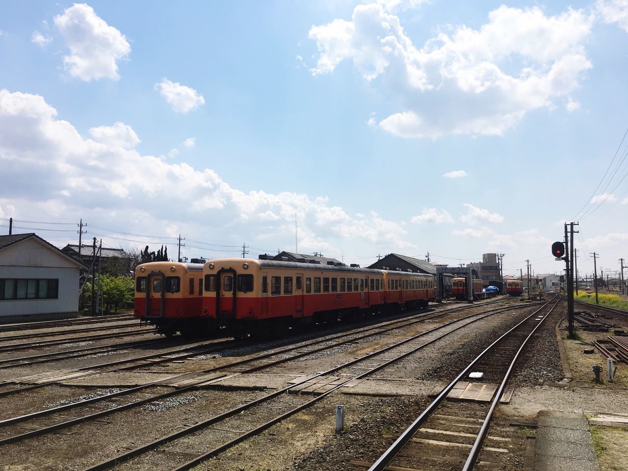 transportation, railroad track, mode of transport, rail transportation, train - vehicle, sky, public transportation, travel, cloud - sky, outdoors, day, railroad station, steam train, railroad station platform, city, no people, locomotive