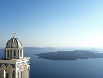 Scenic view of sea against blue sky