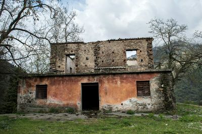 Exterior of old house against sky