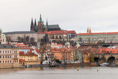 View of buildings in city against sky