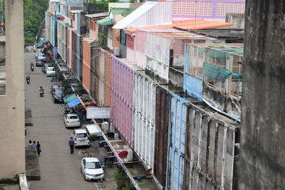 High angle view of street amidst buildings