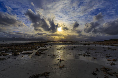 Scenic view of sea against sky at sunset
