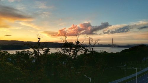 Scenic view of landscape against sky during sunset