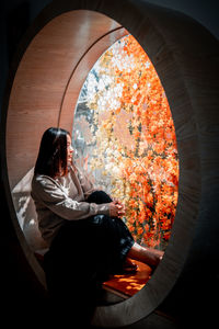 Woman sitting in park