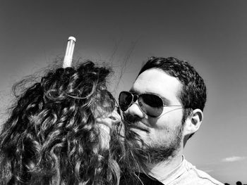 Portrait of young man wearing sunglasses