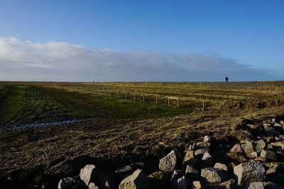 Scenic view of land against sky