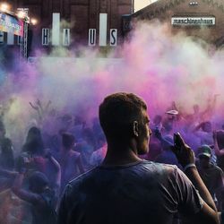 Rear view of people enjoying music concert