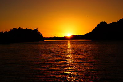 Scenic view of sunset over river