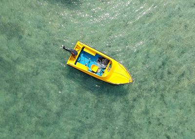 High angle view of yellow floating on water