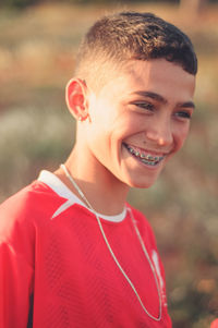 Portrait of smiling boy outdoors