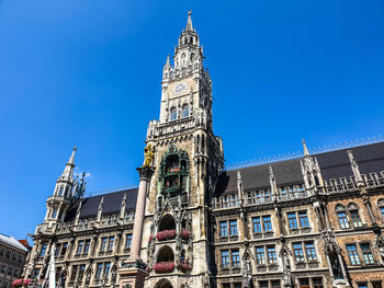 Low angle view of building against blue sky